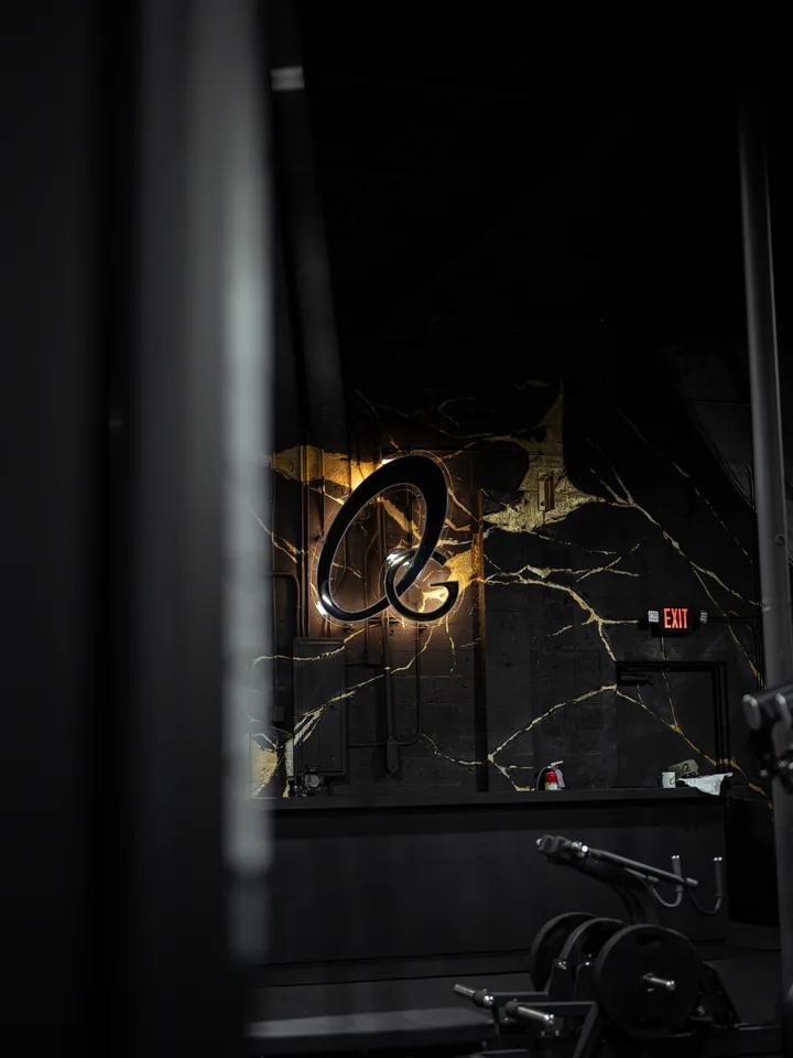 The OG emblem on the gym’s black and gold wall